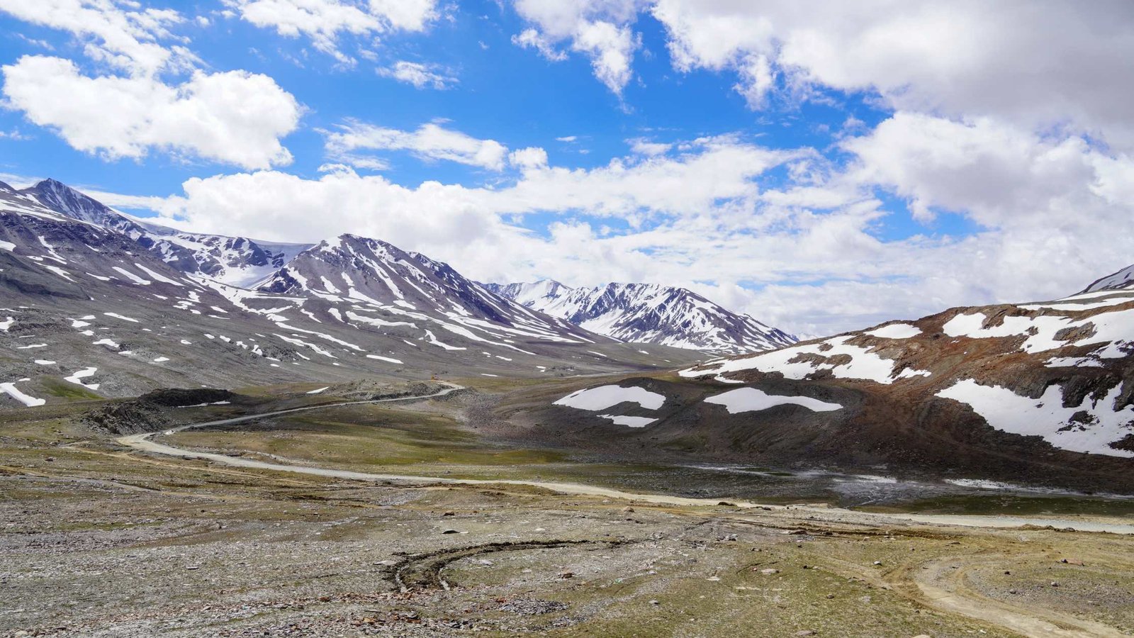 Baralacha La Pass adventure route with snow walls, sharp turns and raw Himalayan beauty