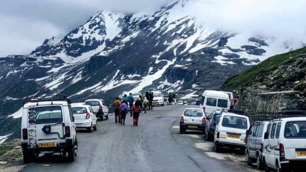 Rohtang Pass in June surrounded by snow-covered mountains and beautiful Himalayan views