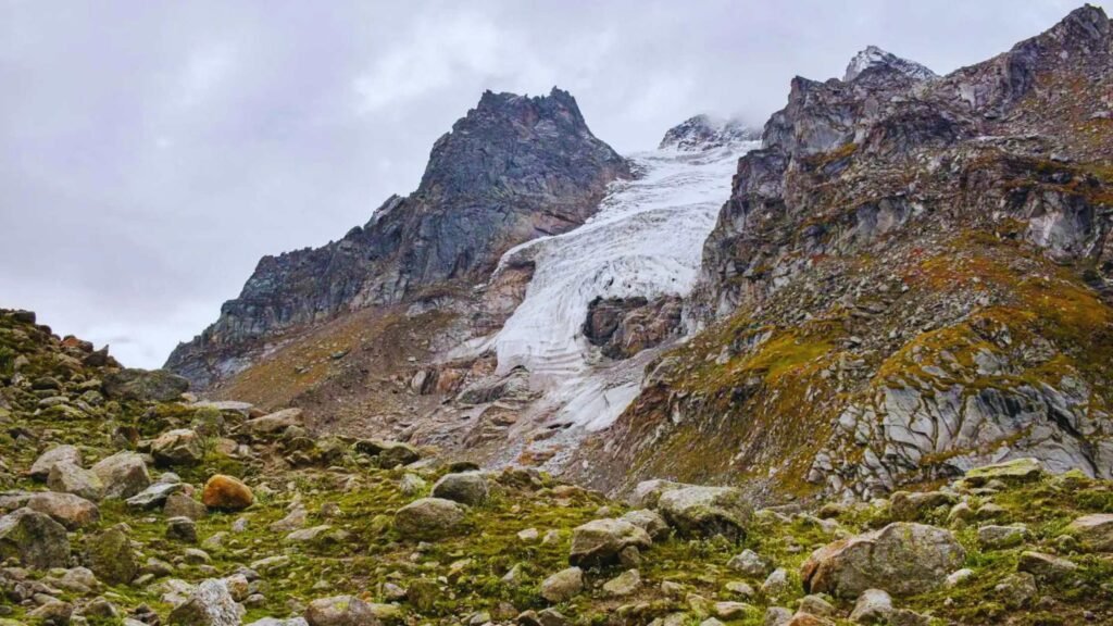 Trekkers crossing Hampta Pass on the famous Manali to Spiti route