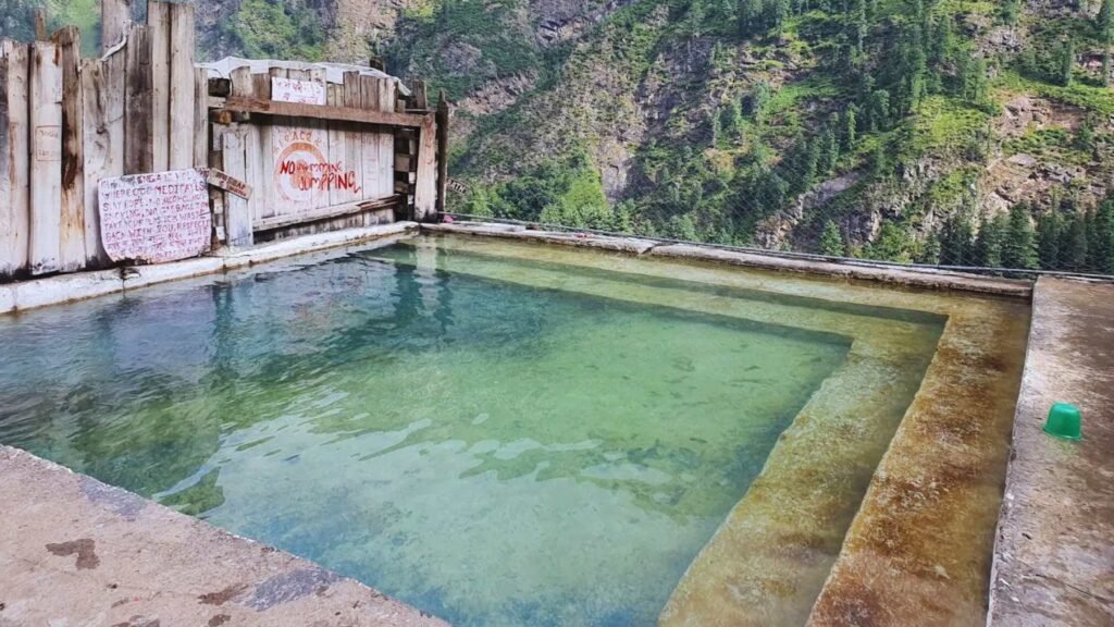 Natural hot springs on the Kheerganga Trek in Kasol surrounded by Himalayan beauty