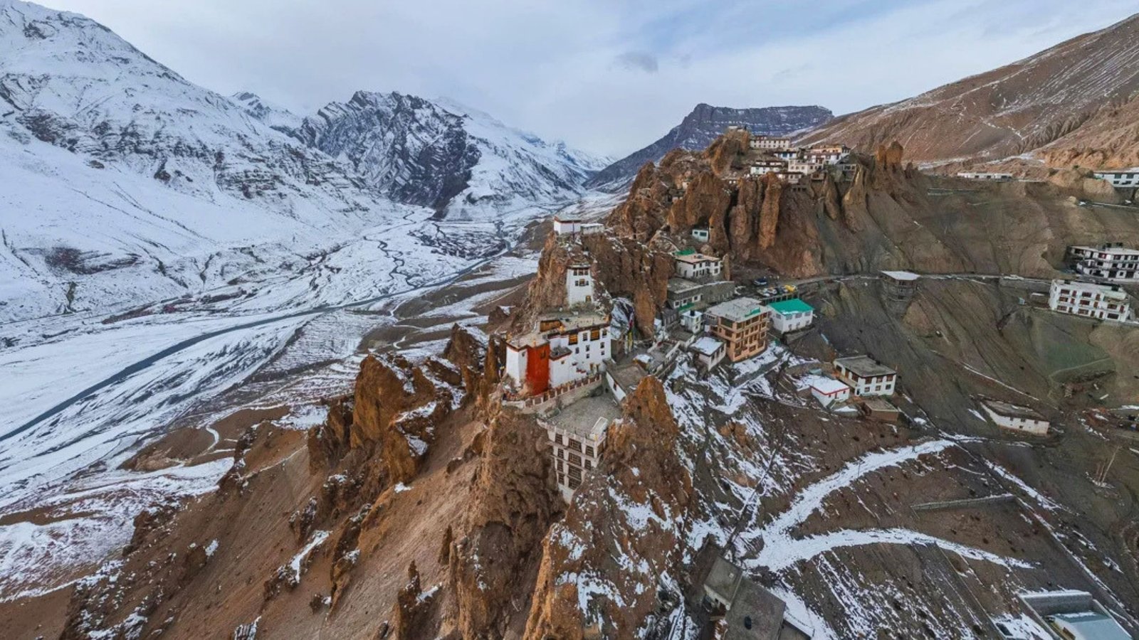 Historic Dhankar Monastery surrounded by rugged Himalayan mountains in Spiti Valley
